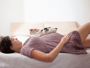 Photo of Pregnant Woman With Cat